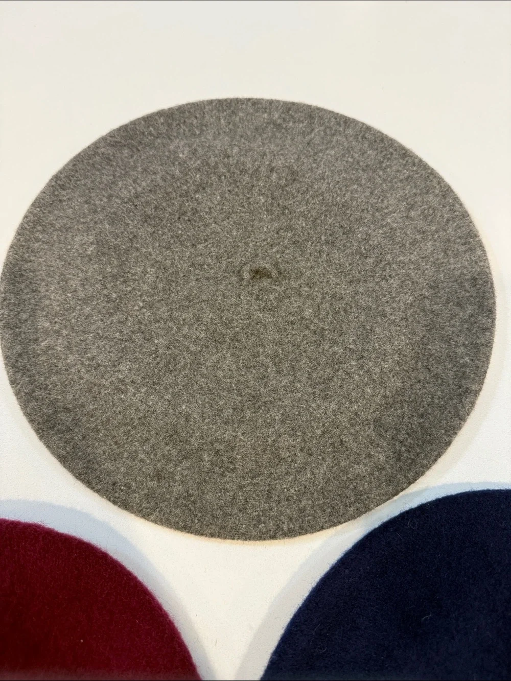 Three Wool Berets in Navy, Burgundy, and Gray
